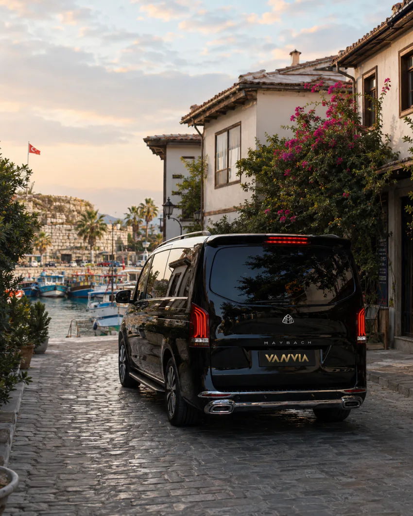 The Vanvia VIP vehicle on a stone street leading down to Sığacık's castle walls and fishing harbour, on the Izmir Airport Sığacık transfer route
