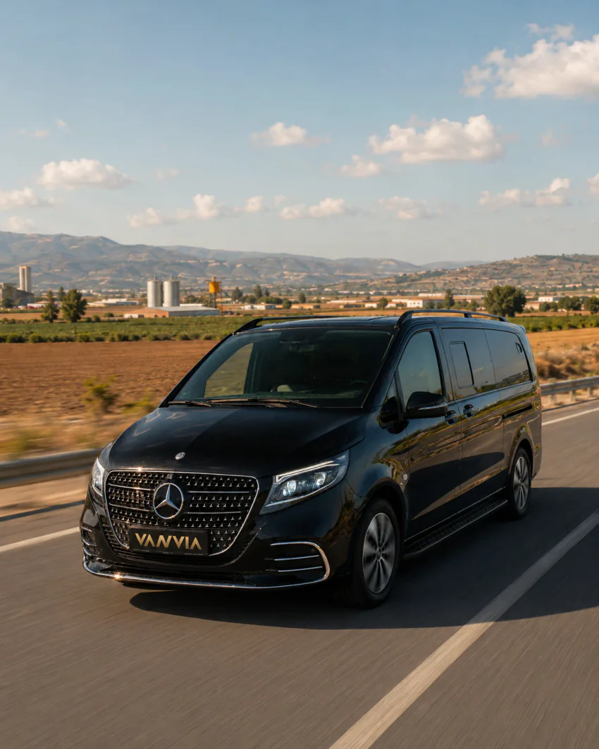 Mercedes-Benz Vito VIP driving past farmland and industrial facilities